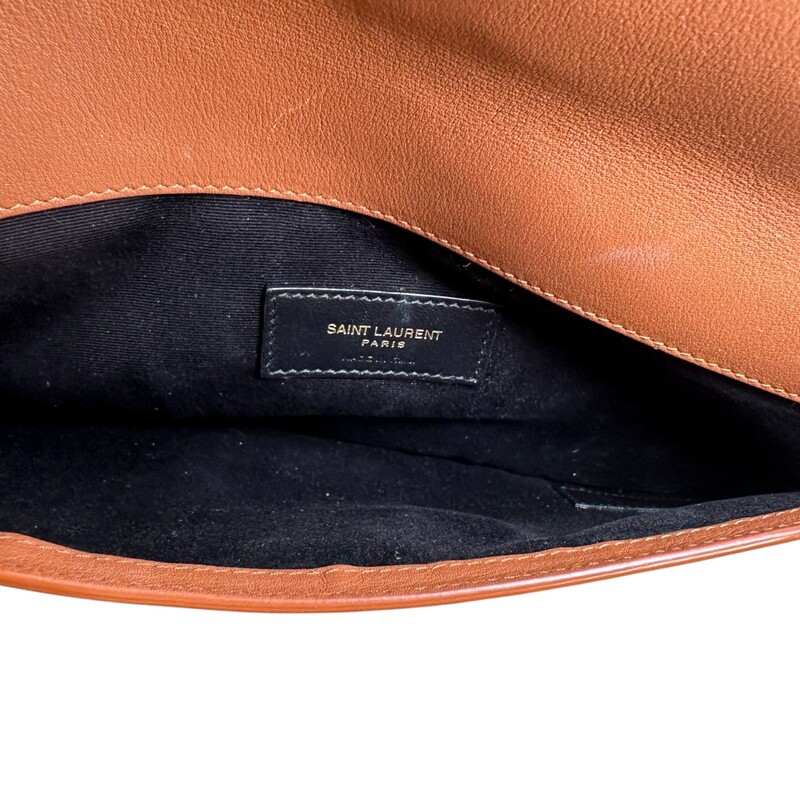 Saint Laurent Uptown Canvas Envelope Clutch<br />
<br />
Serial Code: TCT565739.0721<br />
<br />
Dimensions: 10 L X 6 H inches<br />
<br />
In excellent condition. Faint sctraching on hardware.<br />
<br />
Comes with original dust bag. No box.