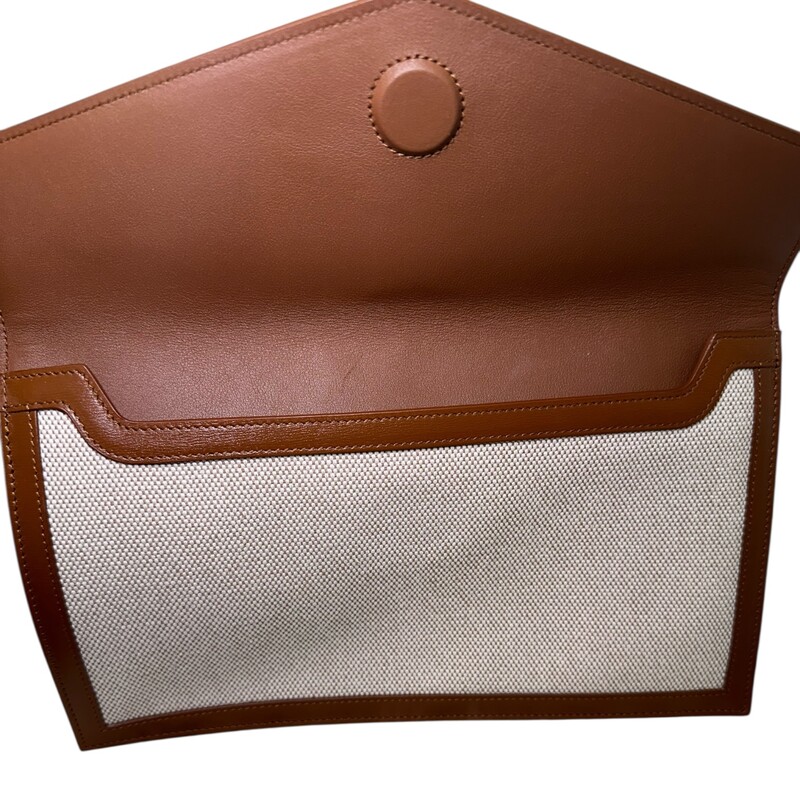 Saint Laurent Uptown Canvas Envelope Clutch<br />
<br />
Serial Code: TCT565739.0721<br />
<br />
Dimensions: 10 L X 6 H inches<br />
<br />
In excellent condition. Faint sctraching on hardware.<br />
<br />
Comes with original dust bag. No box.