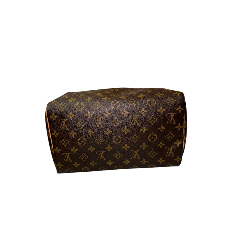 Louis Vuitton Speedy 30 Monogram<br />
<br />
Date Code: SD5125<br />
<br />
Dimensions:<br />
Base length: 12.5 in<br />
Height: 8.25 in<br />
Width: 6.75 in<br />
Drop: 3 in<br />
<br />
In very good condition. Normal wear to the handles. Comes with lock and keys.<br />
<br />
Does not come with the original dust abg or box.