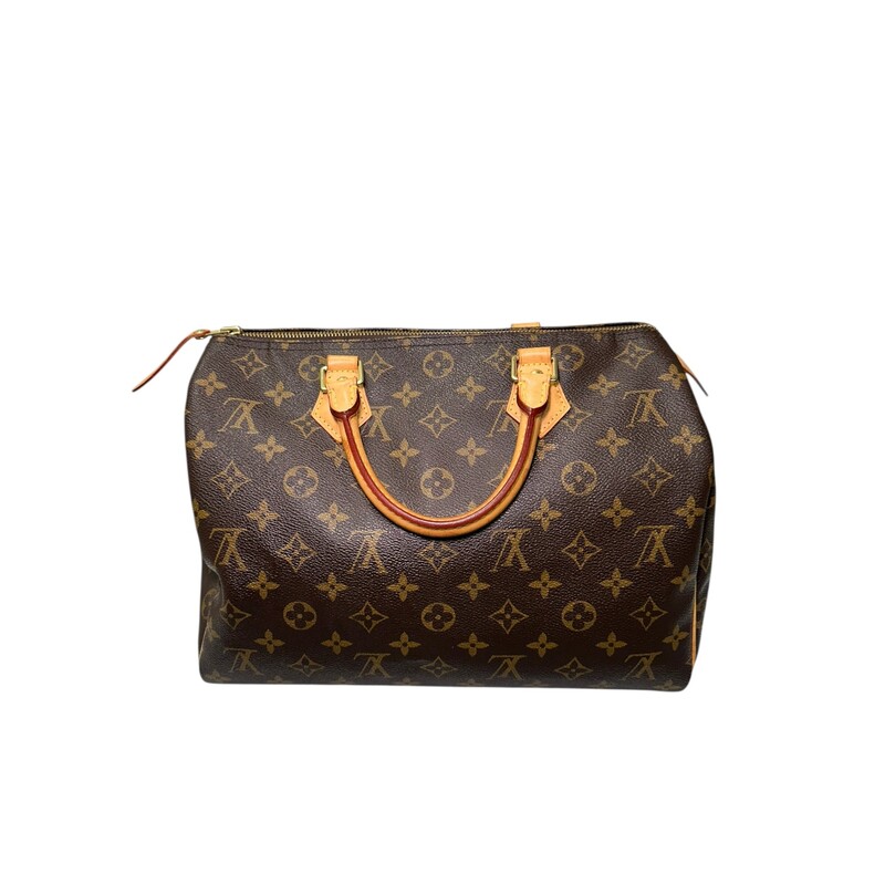 Louis Vuitton Speedy 30 Monogram<br />
<br />
Date Code: SD5125<br />
<br />
Dimensions:<br />
Base length: 12.5 in<br />
Height: 8.25 in<br />
Width: 6.75 in<br />
Drop: 3 in<br />
<br />
In very good condition. Normal wear to the handles. Comes with lock and keys.<br />
<br />
Does not come with the original dust abg or box.
