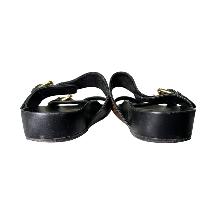 Louis Vuitton Bom Dia Monogram Leather Sandals<br />
<br />
Size: 38<br />
<br />
Style Code: MA0212<br />
<br />
In very good condition. Minor scuffs on the leather and some marks on the bottom.<br />
<br />
Comes with original dust bag and box.
