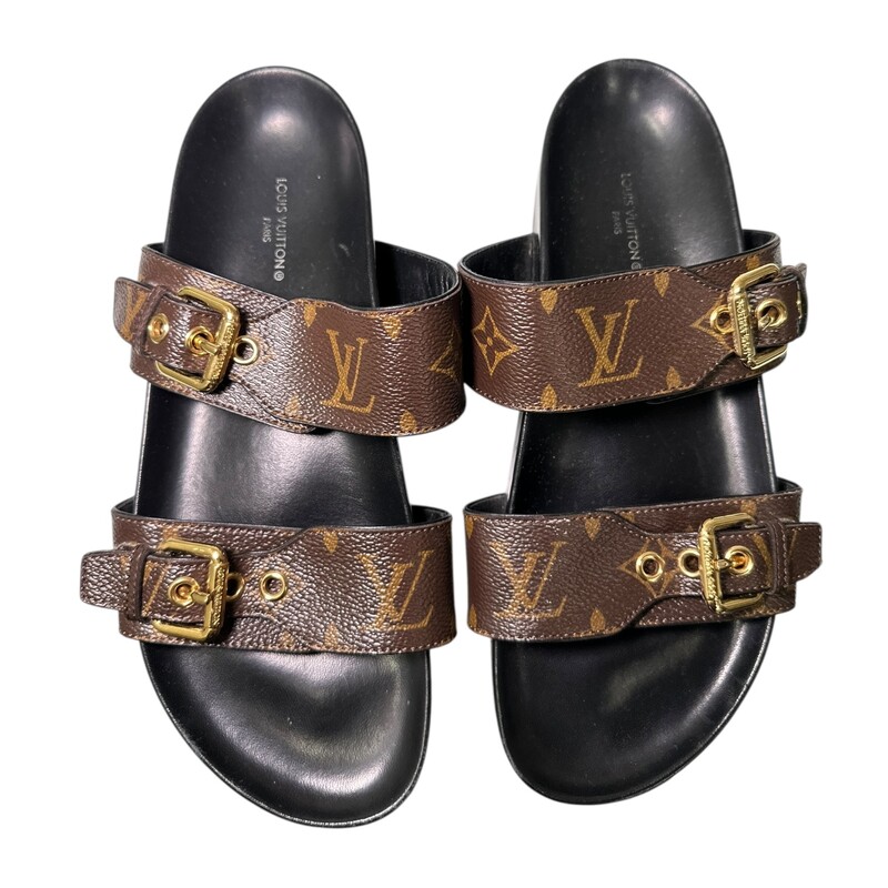 Louis Vuitton Bom Dia Monogram Leather Sandals<br />
<br />
Size: 38<br />
<br />
Style Code: MA0212<br />
<br />
In very good condition. Minor scuffs on the leather and some marks on the bottom.<br />
<br />
Comes with original dust bag and box.