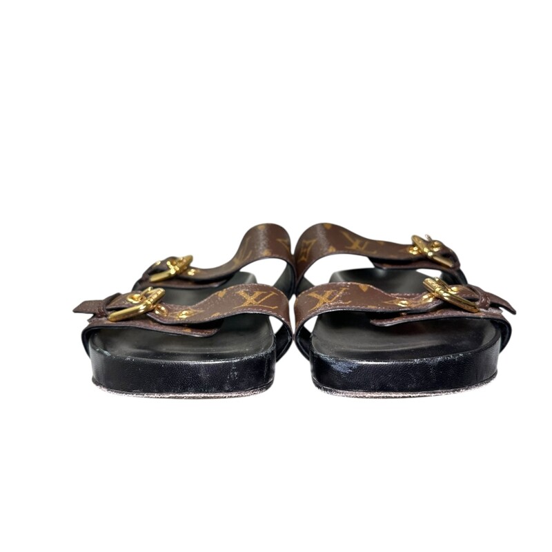 Louis Vuitton Bom Dia Monogram Leather Sandals<br />
<br />
Size: 38<br />
<br />
Style Code: MA0212<br />
<br />
In very good condition. Minor scuffs on the leather and some marks on the bottom.<br />
<br />
Comes with original dust bag and box.