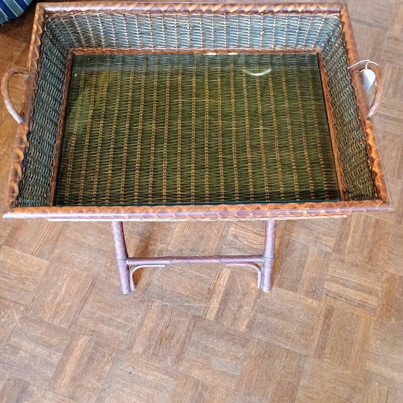 Vtg Butler Tray On Stand

Vintage bamboo/wicker butler tray with stand.  Tray is not attached and sits on top of stand. Tray has handles and a glass insert.

Size: 24 in wide X 18 in deep X 25 in high