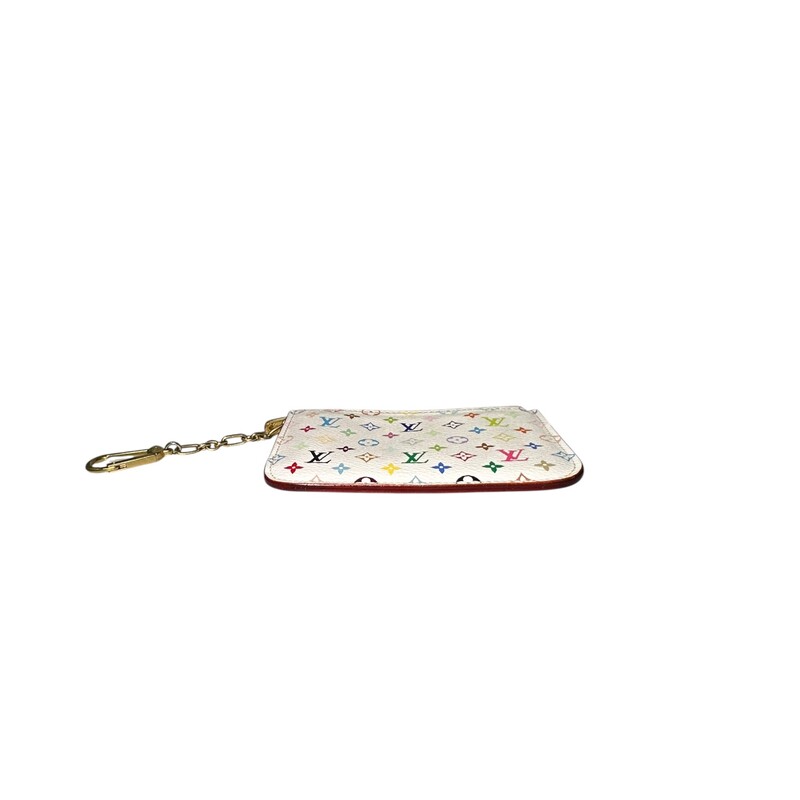 Louis Vuitton x  Murakami White Monogram Zip Pouch

Date Code:CA2112

Dimensions: 5 L x 3 H inches

In very good condition. Some light scratching on hardware and some minor marks on the zipper.

Does not come with original dust bag or box.