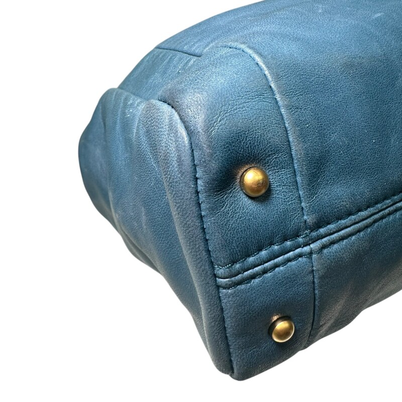Chanel Olsen Lambskin Small Olsen Shoulder Blue Bag<br />
<br />
Code: 784****<br />
<br />
Dimensions:<br />
Base length: 11.75 in<br />
Width: 3.00 in<br />
Height: 9.50 in<br />
Drop: 7.50 in<br />
<br />
In good condition. Wear throughout the leather of the bag.<br />
<br />
Does not come with the original dust bag or box.