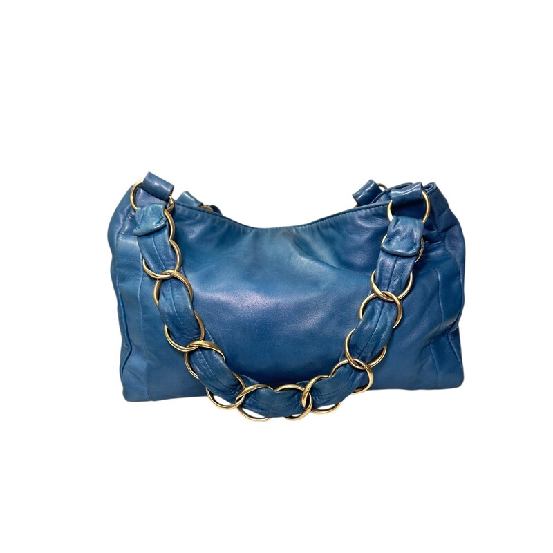Chanel Olsen Lambskin Small Olsen Shoulder Blue Bag<br />
<br />
Code: 784****<br />
<br />
Dimensions:<br />
Base length: 11.75 in<br />
Width: 3.00 in<br />
Height: 9.50 in<br />
Drop: 7.50 in<br />
<br />
In good condition. Wear throughout the leather of the bag.<br />
<br />
Does not come with the original dust bag or box.