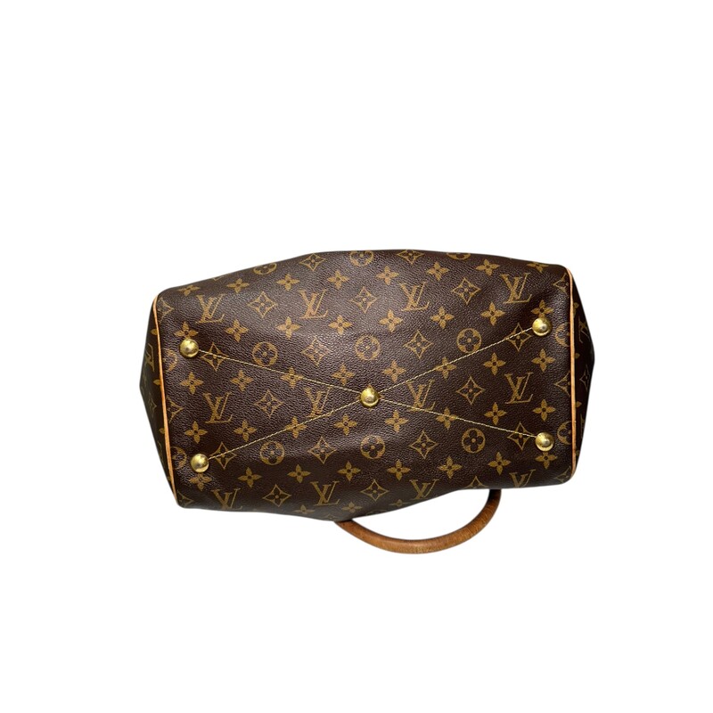 Louis Vuitton Tivoli Monogram GM<br />
<br />
Date Code: SD2059<br />
<br />
Dimnesions:<br />
<br />
Base length: 13 in<br />
Height: 11.5 in<br />
Width: 7.5 in<br />
Drop: 6.25 in<br />
<br />
In fair condition. Some wear to the handles, corner wear, slight tarnishing of the hardware.<br />
<br />
Does not come with original dust bag or box.