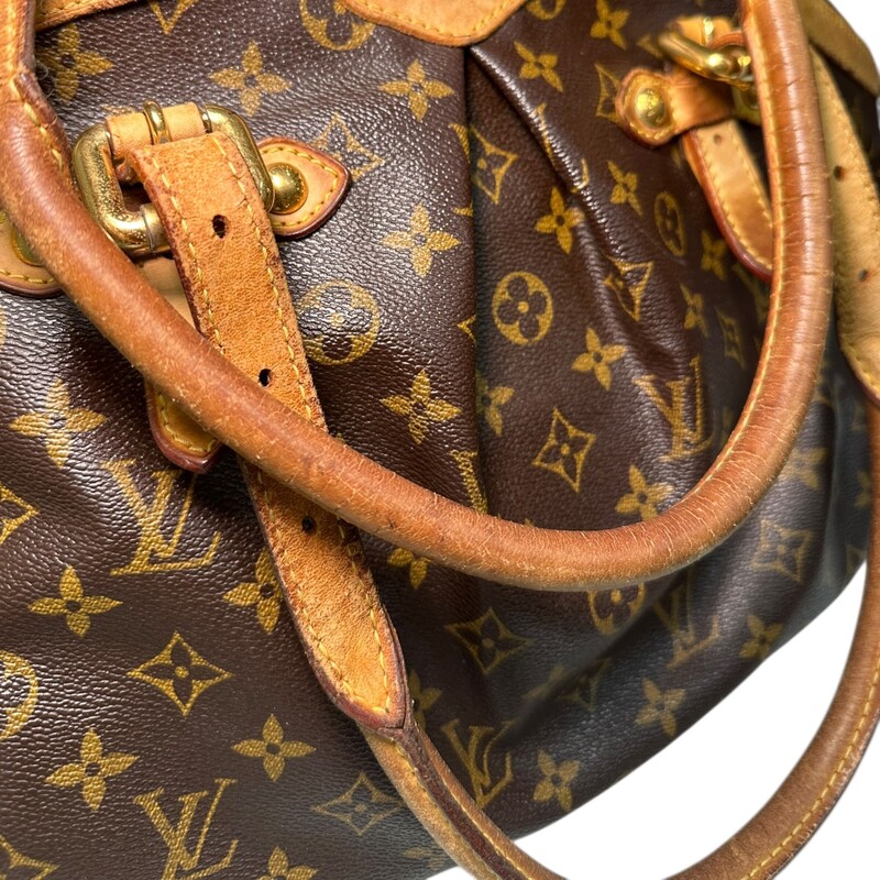 Louis Vuitton Tivoli Monogram GM<br />
<br />
Date Code: SD2059<br />
<br />
Dimnesions:<br />
<br />
Base length: 13 in<br />
Height: 11.5 in<br />
Width: 7.5 in<br />
Drop: 6.25 in<br />
<br />
In fair condition. Some wear to the handles, corner wear, slight tarnishing of the hardware.<br />
<br />
Does not come with original dust bag or box.