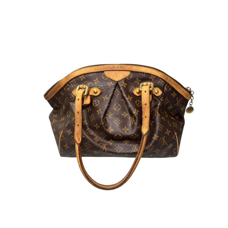 Louis Vuitton Tivoli Monogram GM<br />
<br />
Date Code: SD2059<br />
<br />
Dimnesions:<br />
<br />
Base length: 13 in<br />
Height: 11.5 in<br />
Width: 7.5 in<br />
Drop: 6.25 in<br />
<br />
In fair condition. Some wear to the handles, corner wear, slight tarnishing of the hardware.<br />
<br />
Does not come with original dust bag or box.