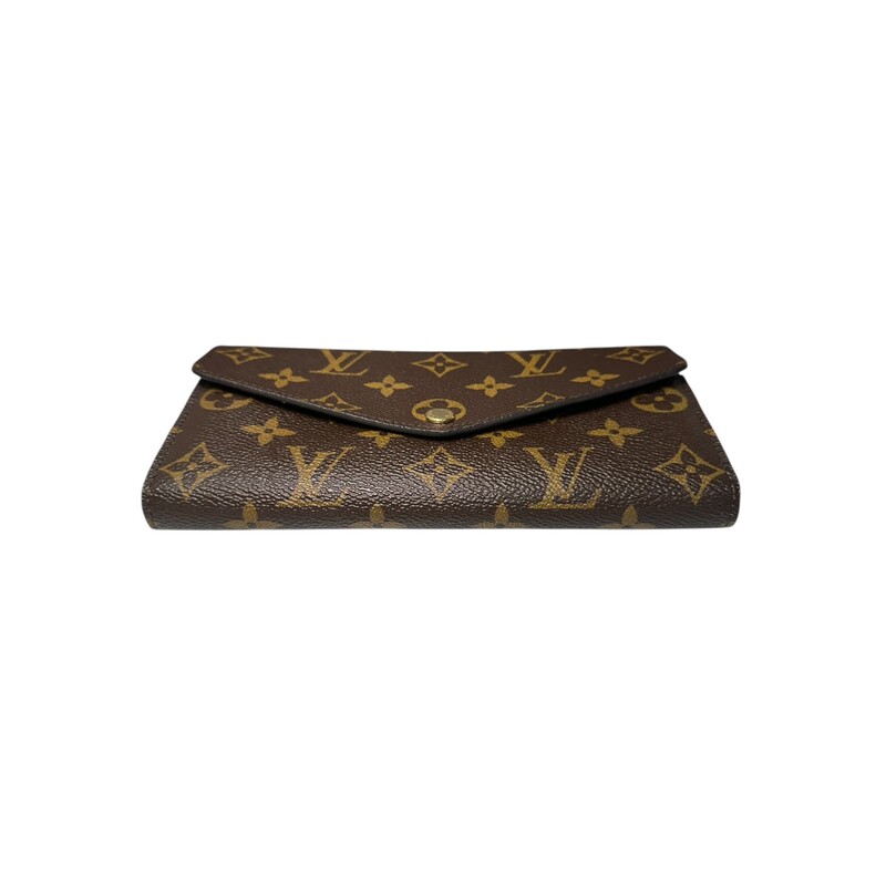 Louis Vuitton Sarah Monogram Wallet

Date Code: Microchip

Dimensions:

Height: 4.5
Width: 7.5
Depth: 1

In very good condition Some puckering on back pocket.

Come with original dust bag. No box.