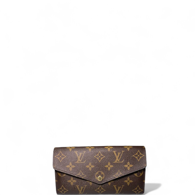 Louis Vuitton Sarah Monogram Wallet

Date Code: Microchip

Dimensions:

Height: 4.5
Width: 7.5
Depth: 1

In very good condition Some puckering on back pocket.

Come with original dust bag. No box.