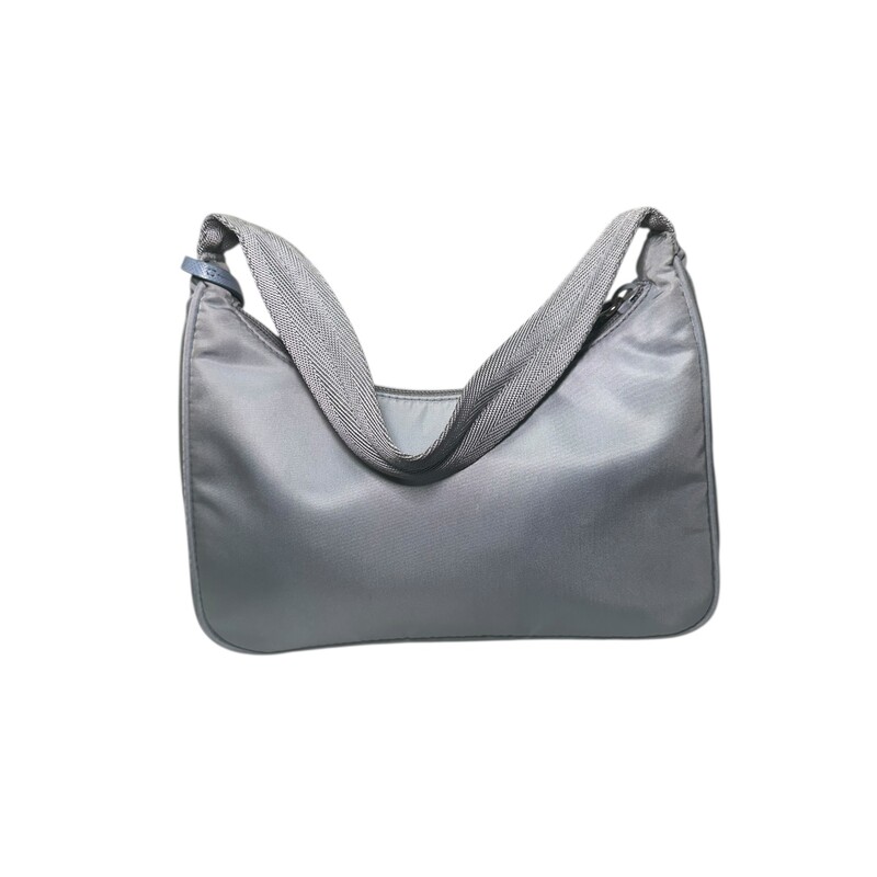 Prada Nylon Re Edition Nylon Bag

Factory Code: 270

Dimensions:
Height: 17cm
Width: 22cm
Length: 6cm

In good condition. Some marks throughout the nylon fabric. Stain on the bottom of the bag.

Does not come with original dust bag or box.