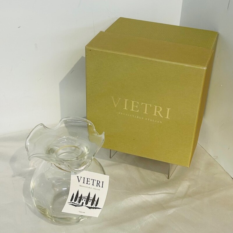 Vietri Hibiscus Glass Vase<br />
Pink Glass<br />
Size: 4.5x5.25H<br />
Mouthblown in Tuscany, the Hibiscus Bud Vase comes nestled in Vietri's signature gift box, complete with straw reminiscent of authentic Italian packaging. Perfect for your best friend's birthday or a thoughtful hostess gift, this piece adds delicate charm to any room or occasion.<br />
NEW Retail $65<br />
Coordinating Vases Sold Separately