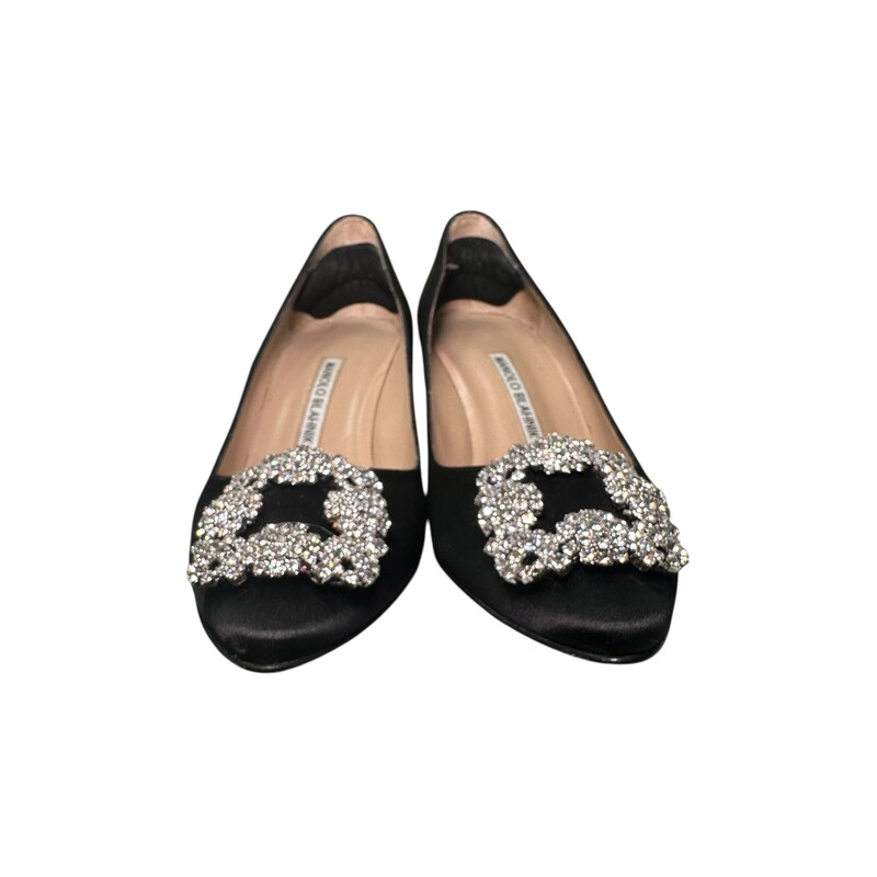 Manolo blahnik Hangisi Black Satin Heels<br />
<br />
Size 37.5<br />
<br />
In very good condition. Light wear on bottoms. Some marks on soles.<br />
<br />
Does not come with original dust bag or box.