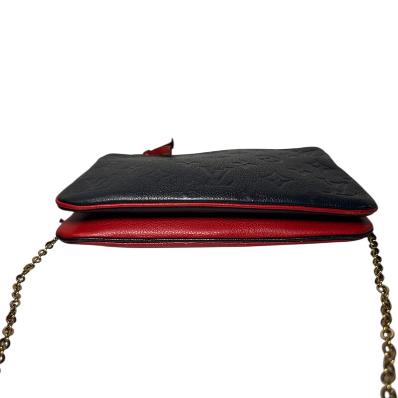 Louis Vuitton Double Zip Marine Rouge Empreinte
Pochette Chain Crossbody

Red/Navy

Date Code: Microchip

Dimensions: Dimensions: 8.5 L  x 5.1 H  x 1.0 W inches
                          Handle Drop: 21.5 inches

Does not come with original dust bag or box.