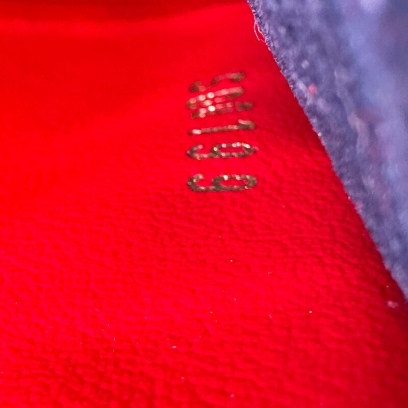 Louis Vuitton Double Zip Marine Rouge Empreinte<br />
Pochette Chain Crossbody<br />
<br />
Red/Navy<br />
<br />
Date Code: Microchip<br />
<br />
Dimensions: Dimensions: 8.5 L  x 5.1 H  x 1.0 W inches<br />
                          Handle Drop: 21.5 inches<br />
<br />
Does not come with original dust bag or box.