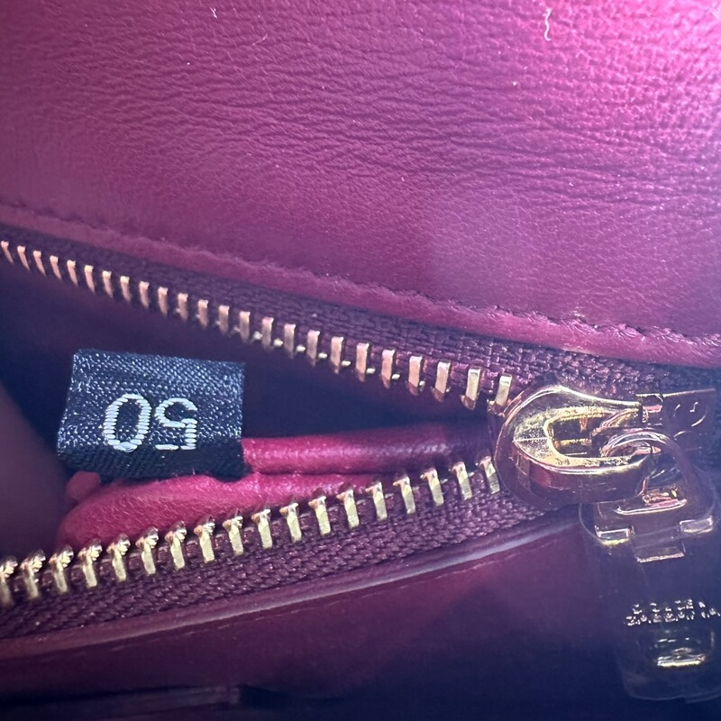 Dolce & Gabbana Lucia, Python Top Handle Bag<br />
<br />
Dimensions:6.5 H x 9.5 W  inches<br />
<br />
In very good condition. Some scratching of the hardware.<br />
<br />
Does not come with original dust bag or box.