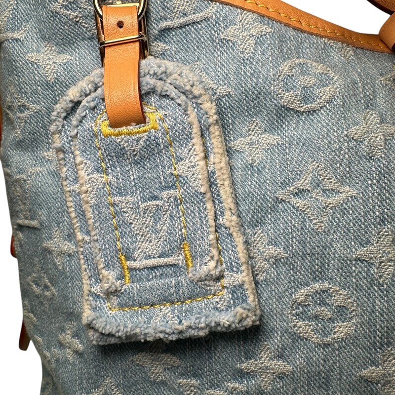 Louis Vuitton Carryall PM Monogram Denim<br />
<br />
Code: Chipped<br />
<br />
Dimensions:<br />
Length: 11 in<br />
Height: 9.5 in<br />
Width: 5.25 in<br />
Drop: 16.5 in<br />
<br />
In very good condition. Light stain on front of bag. Comes with the tag and pochette.<br />
<br />
Comes with the original dust bag. No box.