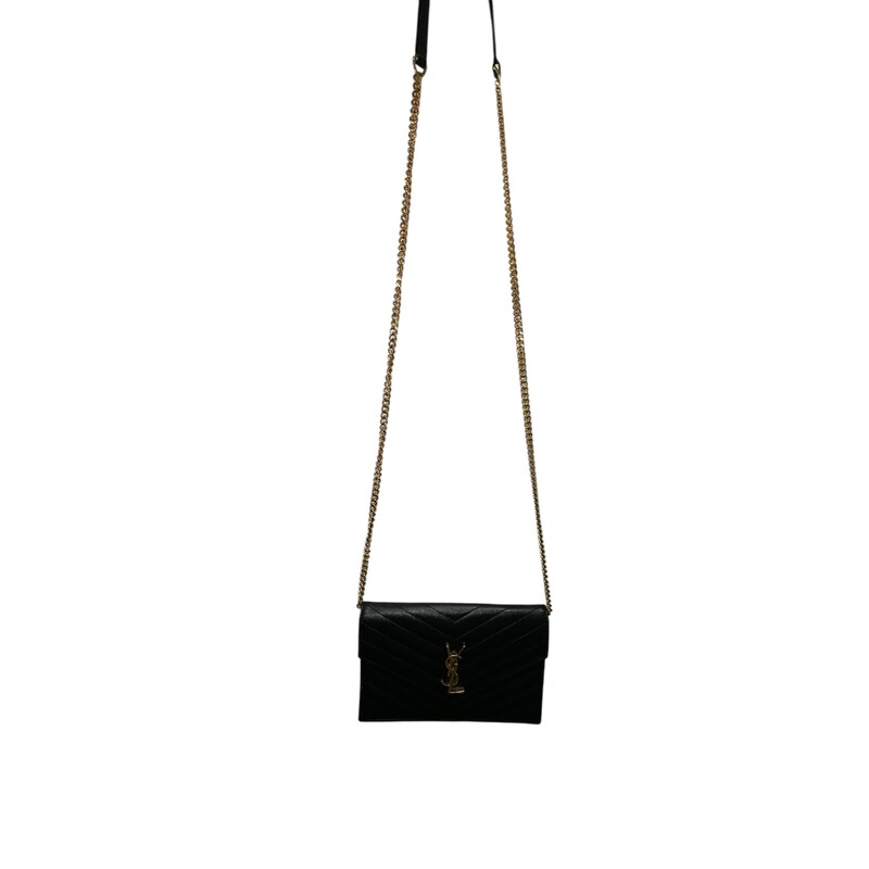 Saint Laurent Grained Leather Cassandre Woc<br />
<br />
Style number: YBL393953.0521<br />
<br />
Dimensions:7.5 L  x 5 H inches<br />
<br />
In very good condition. Scratching of the hardware.<br />
<br />
Comes with the original dust bag and box.