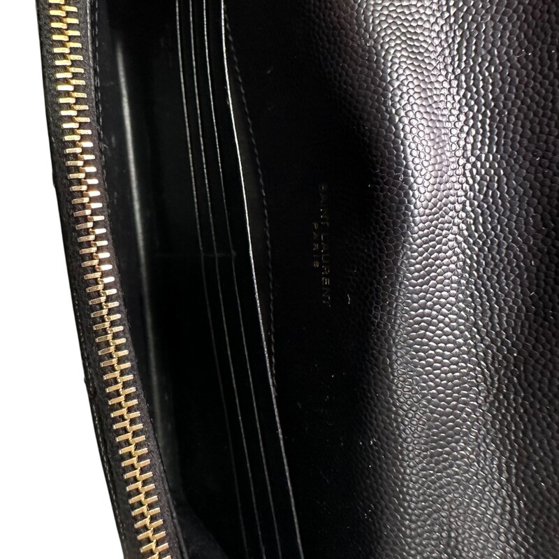 Saint Laurent Grained Leather Cassandre Woc<br />
<br />
Style number: YBL393953.0521<br />
<br />
Dimensions:7.5 L  x 5 H inches<br />
<br />
In very good condition. Scratching of the hardware.<br />
<br />
Comes with the original dust bag and box.