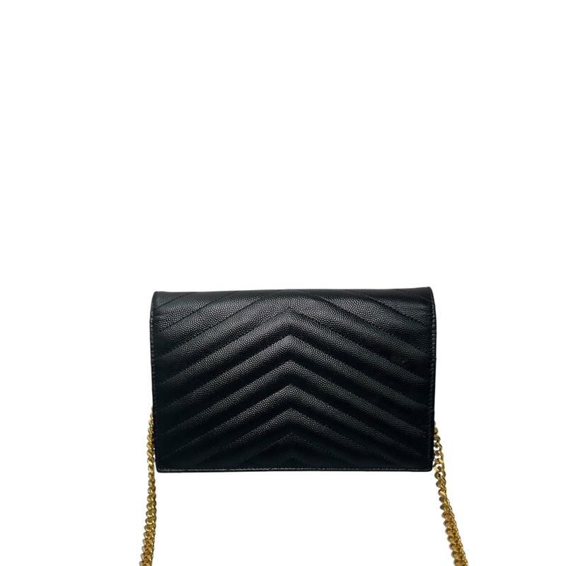 Saint Laurent Grained Leather Cassandre Woc<br />
<br />
Style number: YBL393953.0521<br />
<br />
Dimensions:7.5 L  x 5 H inches<br />
<br />
In very good condition. Scratching of the hardware.<br />
<br />
Comes with the original dust bag and box.