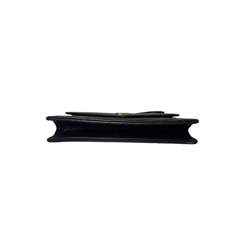 Saint Laurent Grained Leather Cassandre Woc<br />
<br />
Style number: YBL393953.0521<br />
<br />
Dimensions:7.5 L  x 5 H inches<br />
<br />
In very good condition. Scratching of the hardware.<br />
<br />
Comes with the original dust bag and box.