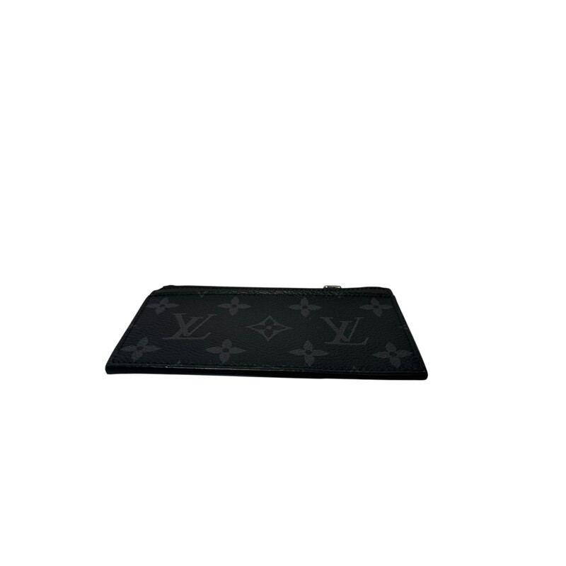 Louis Vuitton Monogram Eclipse Taiga Card Holder<br />
<br />
Date Code: NZ 4129<br />
<br />
Dimensions:<br />
<br />
Base length: 6 in<br />
Height: 3 in<br />
Width: 0.5 in<br />
<br />
In very good condition. minor surface scratches