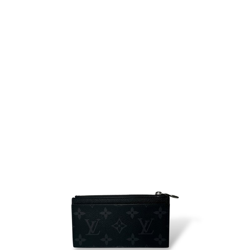 Louis Vuitton Monogram Eclipse Taiga Card Holder<br />
<br />
Date Code: NZ 4129<br />
<br />
Dimensions:<br />
<br />
Base length: 6 in<br />
Height: 3 in<br />
Width: 0.5 in<br />
<br />
In very good condition. minor surface scratches