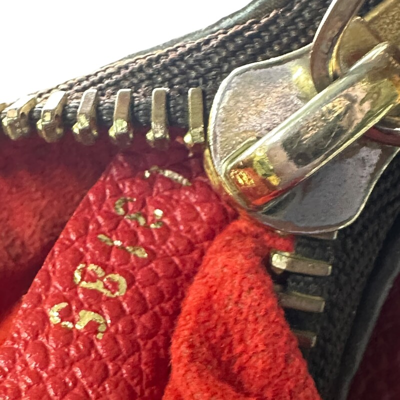 Louis Vuitton Twice Red Monogram Crossbody<br />
<br />
Date Code:FL3185<br />
<br />
Dimensions: 9 L X 6 H inches<br />
<br />
In good condition. Some wear on the leather, interior marks, and some scratching od the hardware.<br />
<br />
Does not come with original dust bag or box.