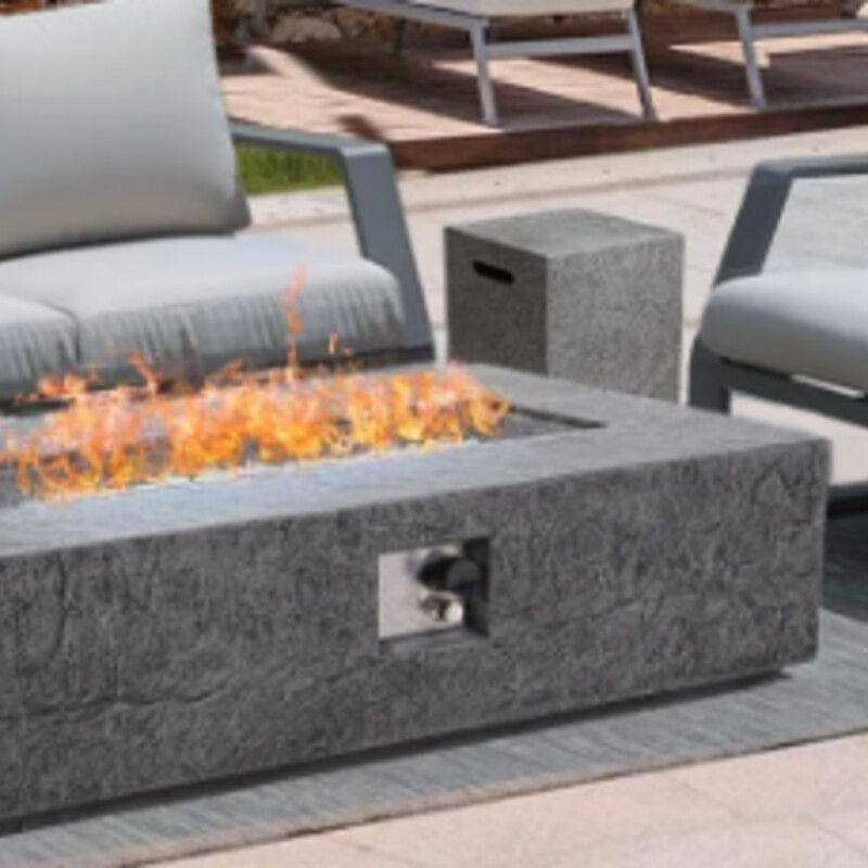 Naga Bahna 2pc Propane Fire Pit<br />
Grey with Glass Wind Guard<br />
Size: 56x28x13H<br />
Lightweight Concrete: This outdoor fire table set is constructed of lightweight concrete and features a modern light beige finish. This provides a highly durable structure that can hold a substantial amount of weight.<br />
50,000 BTU: Featuring a rectangular shape and a BTU of 50,000, our gas fire pit table allows easy seating arrangements for you and your guests, providing light and warmth all around during those chilly evenings.<br />
Multi-functional: This accessory provides plenty of tablespace on one side, allowing you to use this as both a coffee table and a patio fire pit propane.<br />
Glass Wind Guard: This rectangle fire pit table comes with a matching glass guard to protect you from fire damage and increases aesthetics. This is made of tempered glass so you can rest assured of the quality and arrange this piece however you please and your set will always look classy.<br />
NEW Retail $460   ITEM NOT IN STORE YET. CALL STORE FOR INFO 440-835-1403