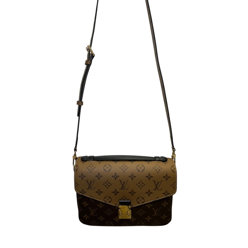 Louis Vuitton Metis Reverse Monogram Crossbody<br />
<br />
Date Code: Chipped<br />
<br />
Dimensions:<br />
9.8 x 7.5 x 2.8 inches<br />
(Length x Height x Width)<br />
<br />
In excellent condition.<br />
<br />
Comes with the original dust bag. No box.