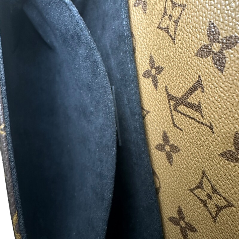 Louis Vuitton Metis Reverse Monogram Crossbody<br />
<br />
Date Code: Chipped<br />
<br />
Dimensions:<br />
9.8 x 7.5 x 2.8 inches<br />
(Length x Height x Width)<br />
<br />
In excellent condition.<br />
<br />
Comes with the original dust bag. No box.