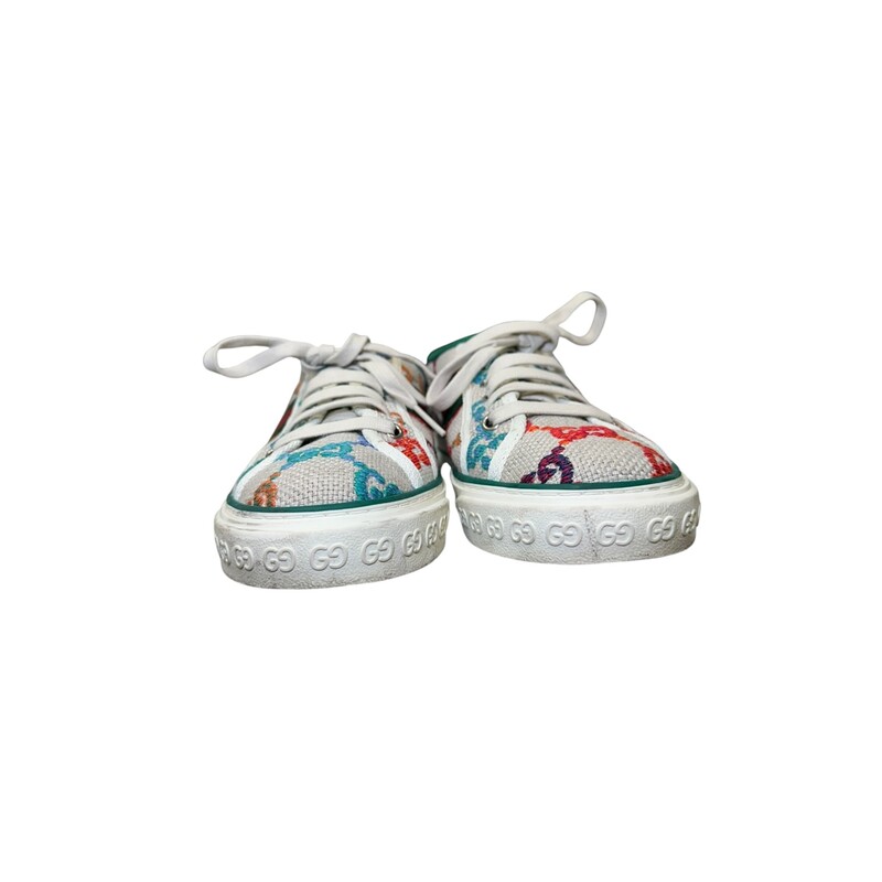 Gucci Psychedlic Tennis 1977 Multicolor Sneakers<br />
<br />
Size 6+M<br />
<br />
In good xondition. Wear throughout the sneakers. Scuffs and marks. Deformed a bit around the ankles.<br />
<br />
Does not come with the original dust bag or box.
