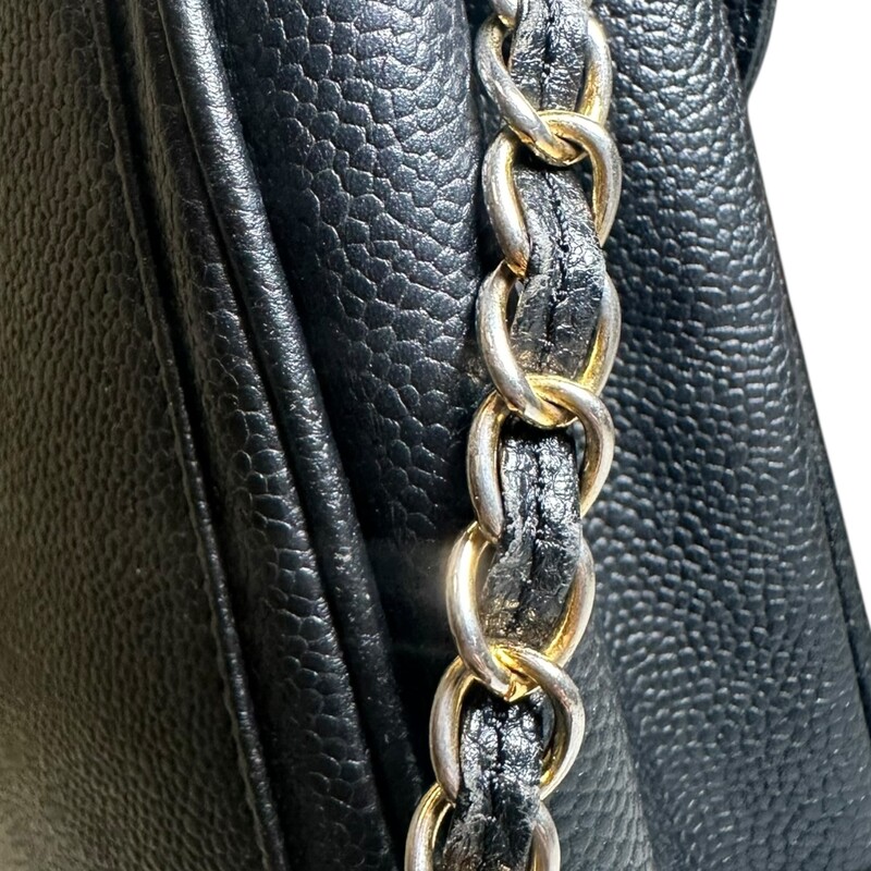 Chanel Penguin Caviar Crossbody 1991-1994 Collection<br />
<br />
Date Code: 2458630<br />
<br />
Dimensions: 9 H x 5.4 L inches<br />
<br />
In good condition. Original leather interior has been removed. Hologram has been removed. Discoloration and scratching of hardware and interior marks.<br />
<br />
Comes with the original authenticity card. Does not come with original dust bag or box.