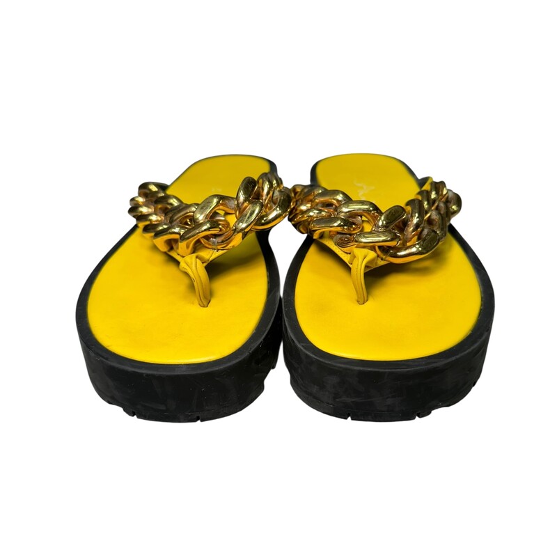 Versace Chain Leather Sandals<br />
<br />
 Yellow,Gold<br />
<br />
 Size: 41<br />
<br />
In good condition, Some scratches and rubbed off logo on soles.<br />
<br />
Does not come with original dust bag or box.