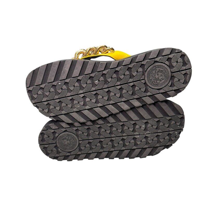 Versace Chain Leather Sandals<br />
<br />
 Yellow,Gold<br />
<br />
 Size: 41<br />
<br />
In good condition, Some scratches and rubbed off logo on soles.<br />
<br />
Does not come with original dust bag or box.