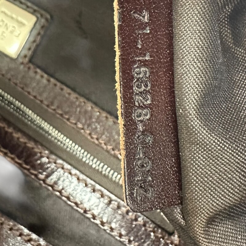 Fendi Zucca Logo Tote<br />
<br />
Serial Code: 71-16328-0--012<br />
<br />
Dimensions: 14L x 11H inches<br />
<br />
In very good condition. Some scratches on the leather strap and leather bottom.<br />
<br />
Does not come with original dust bag or box.