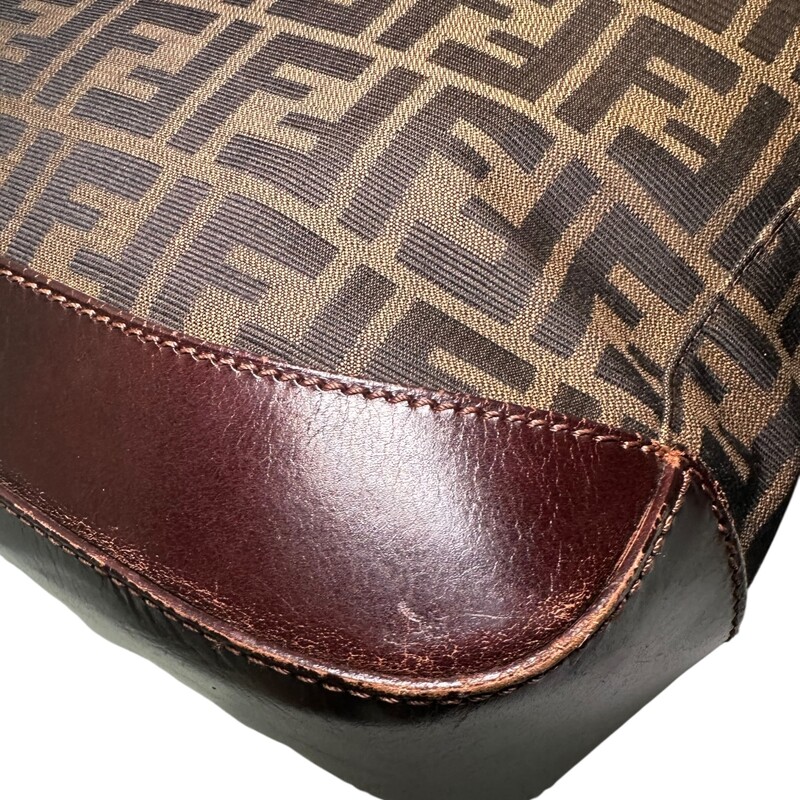 Fendi Zucca Logo Tote<br />
<br />
Serial Code: 71-16328-0--012<br />
<br />
Dimensions: 14L x 11H inches<br />
<br />
In very good condition. Some scratches on the leather strap and leather bottom.<br />
<br />
Does not come with original dust bag or box.