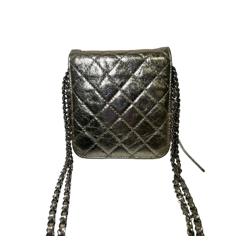 Chanel Clams Metallic Wallet On A Chain<br />
<br />
Serial Code: 16247070<br />
<br />
Dimensions:<br />
Height: 6 x Width: 5.5 xDepth: 1.75 inches<br />
<br />
In very good condition. Minor scratching on hardware.<br />
<br />
Doe not come with original dust bag or box.