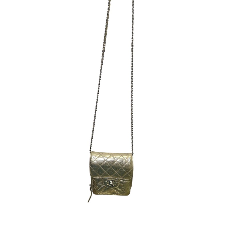 Chanel Clams Metallic Wallet On A Chain<br />
<br />
Serial Code: 16247070<br />
<br />
Dimensions:<br />
Height: 6 x Width: 5.5 xDepth: 1.75 inches<br />
<br />
In very good condition. Minor scratching on hardware.<br />
<br />
Doe not come with original dust bag or box.