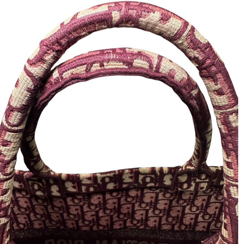 Dior Oblique Book BurgundyTote<br />
<br />
Date Code:50-MA-0168<br />
<br />
Dimensions: 17 L x 13 H inches<br />
<br />
In very good condition. Some minor corner wear.<br />
<br />
Does not come with original dust bag or box.