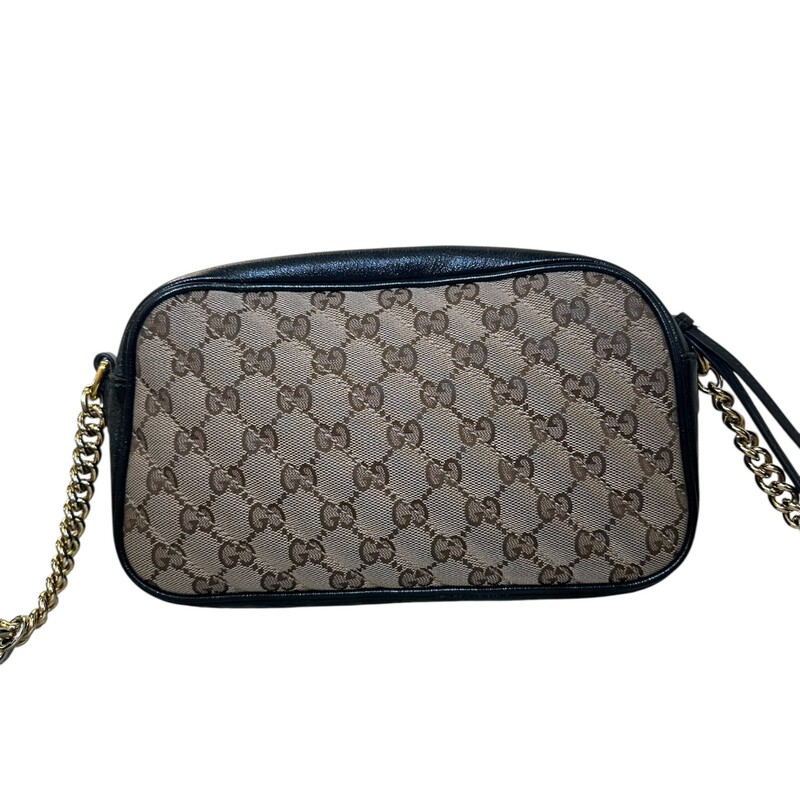 Gucci Marmont  Monogram Canvas Crossbody<br />
<br />
Style Code: 447632 4876628<br />
<br />
Dimensions: 9L  x 6 H inches<br />
<br />
In good condition. Some light discoloration of the harware, slight wear on the leather piping and interior marks.<br />
<br />
Does not come with oriignal dust bag or box.