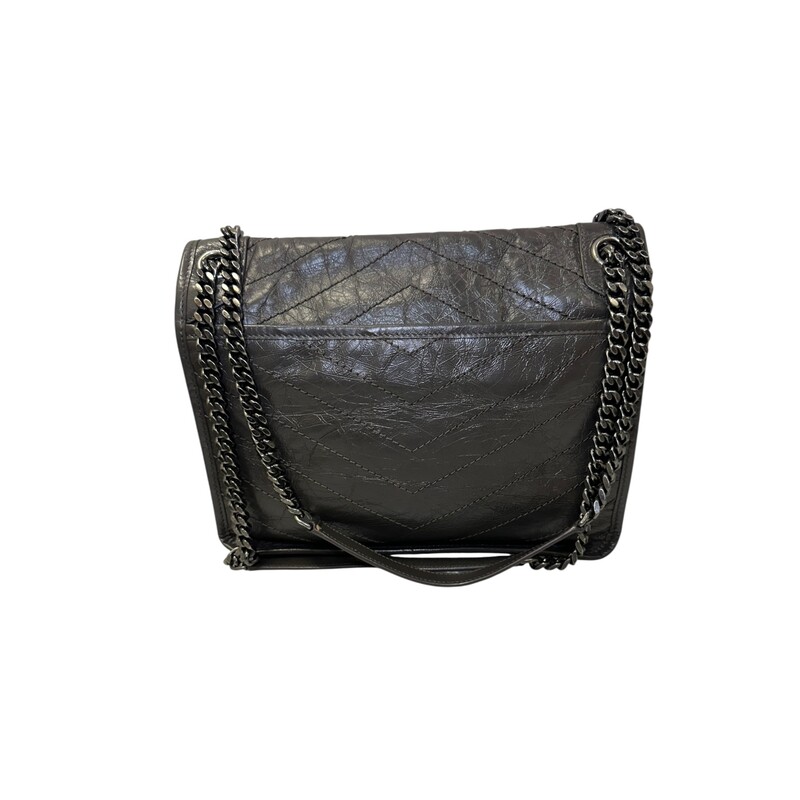 YSL Niki Flap Light Musk<br />
<br />
Code: YSL49888941219<br />
<br />
Dimensions:<br />
10.5W x 7.5H x 3.25D<br />
<br />
In very good condition.  Light wear to the corners and logo.<br />
<br />
Comes with the original dust bag and box.