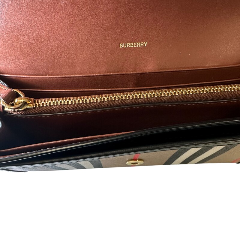 Burberry Icon Canvas Check Wallet<br />
<br />
Dimensions:7 3/4 W  x 4 H x 3/4 D inches<br />
<br />
In very good condition. Some minor scratches on the canvas.<br />
<br />
Does not come with the original dust bag or box.
