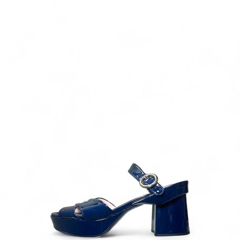 Prada Crisscross Patent Navy

Size: 37

In excellent condition.

Does not come with the original dust bag or box.