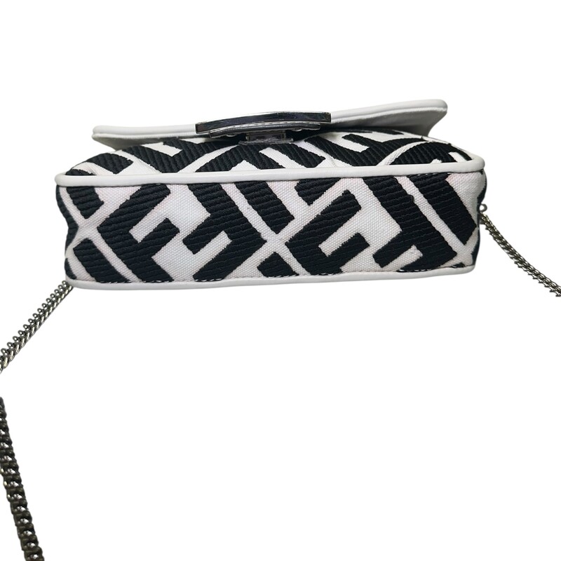 Fendi Zucca Baguette Canvas New Model Crossbody<br />
<br />
Serial Code:8BS017 A JQY 238 4095<br />
<br />
Dimensions:7 L X 5 H inches<br />
<br />
In very good condition.Some discoloration of the canvas. Small scratches of the canvas. Some scratches on the hardware.<br />
<br />
Comes with original dust bag. No box
