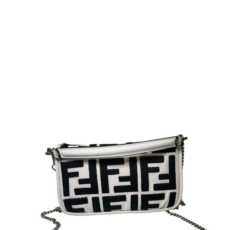 Fendi Zucca Baguette Canvas New Model Crossbody<br />
<br />
Serial Code:8BS017 A JQY 238 4095<br />
<br />
Dimensions:7 L X 5 H inches<br />
<br />
In very good condition.Some discoloration of the canvas. Small scratches of the canvas. Some scratches on the hardware.<br />
<br />
Comes with original dust bag. No box