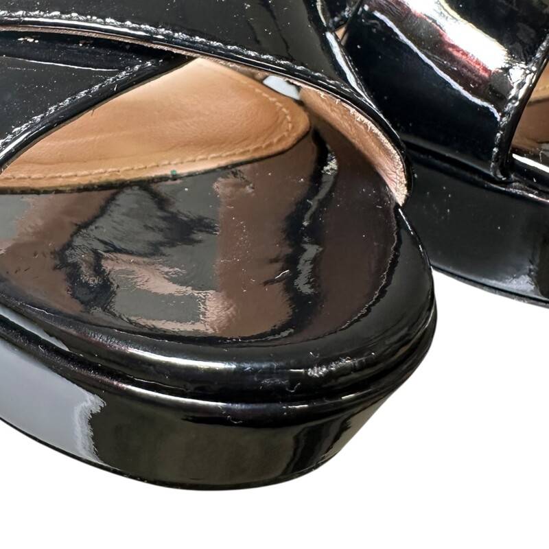 Prada Crisscross Patent Black<br />
<br />
Size: 37<br />
<br />
In excellent condition. Slight toe wear<br />
<br />
Does not come with the original dust bag or box.