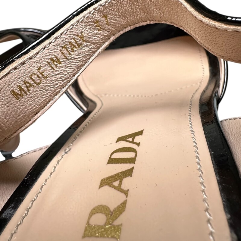 Prada Crisscross Patent Black<br />
<br />
Size: 37<br />
<br />
In excellent condition. Slight toe wear<br />
<br />
Does not come with the original dust bag or box.